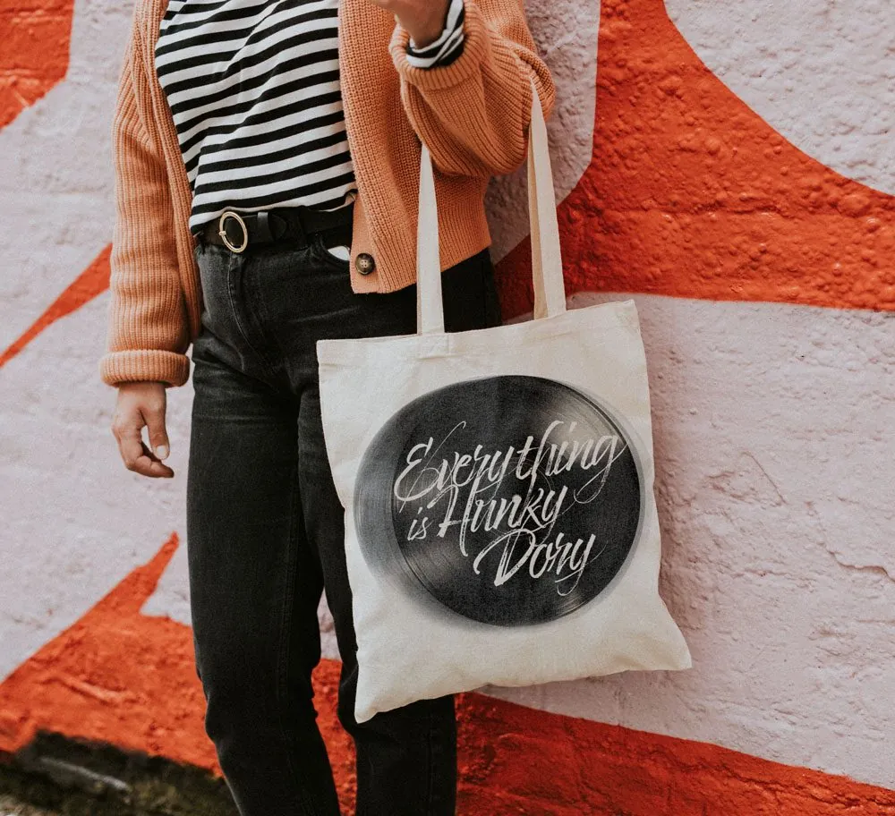 A canvas tote printed with a record and the script line Everything is Hunky Dory