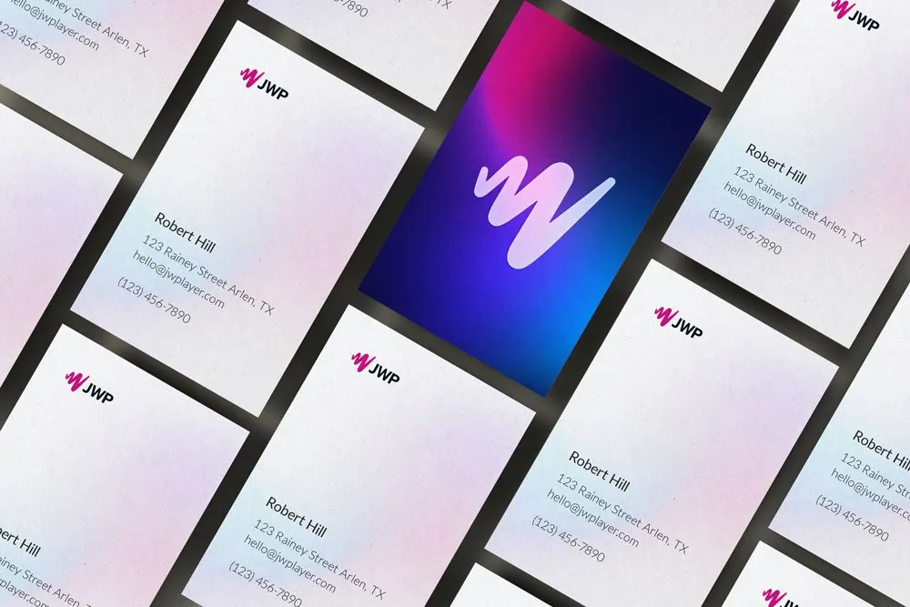 JWP business cards: soft gradient fronts with the JWP logo, and one card back with the W on a deep blue-to-magenta gradient