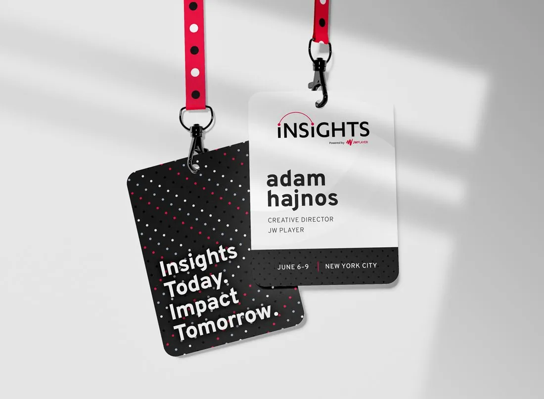 Two Insights badges on red dotted lanyards: a name badge and a back reading Insights Today. Impact Tomorrow.